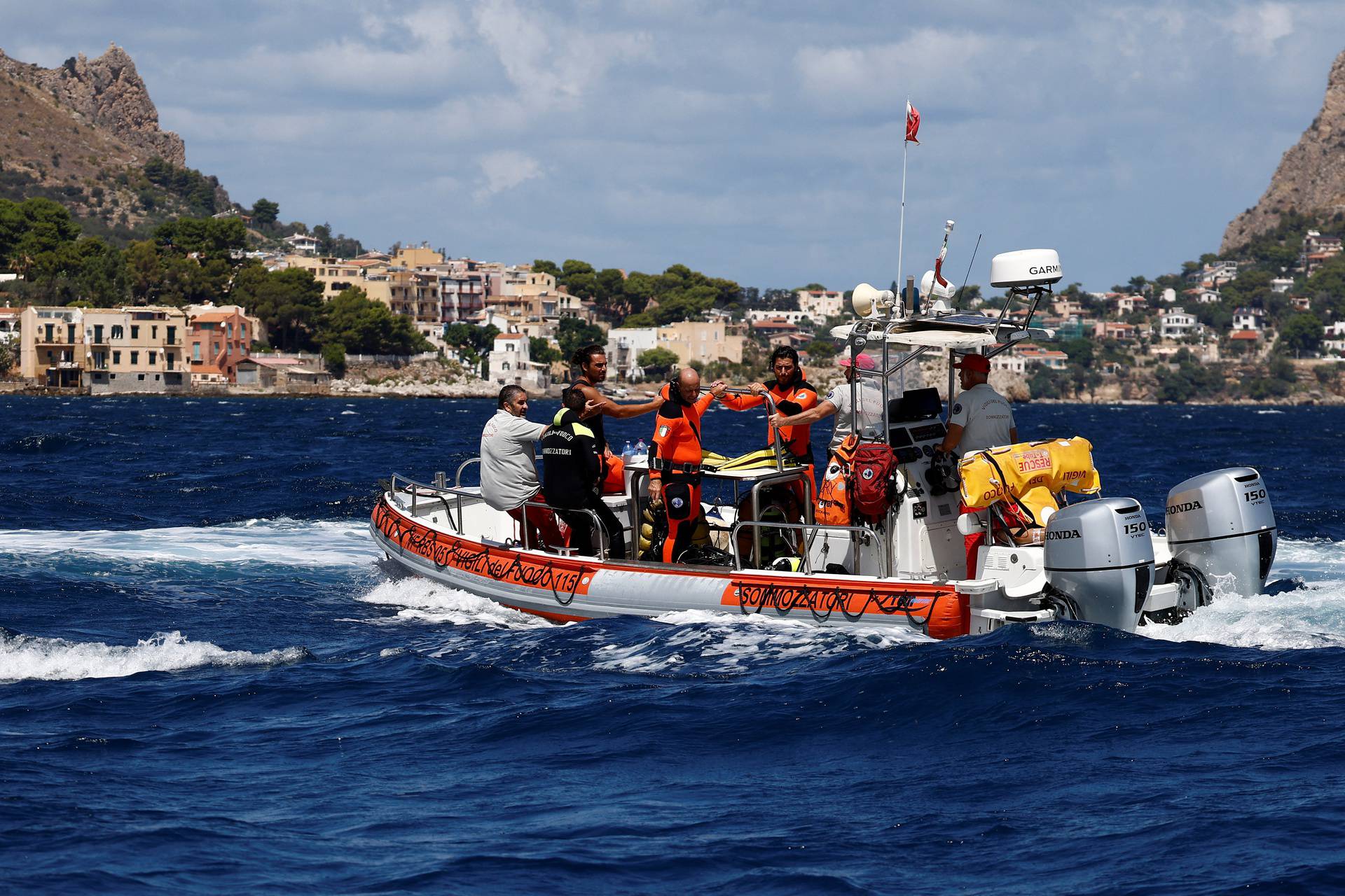 Rescue operations continue after a luxury yacht sank off Sicily