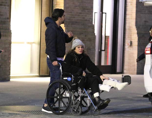 *EXCLUSIVE* Mick Jagger's ex Luciana Gimenez is seen for the first time in a wheelchair after fracturing her leg in a horror skiing accident in Aspen