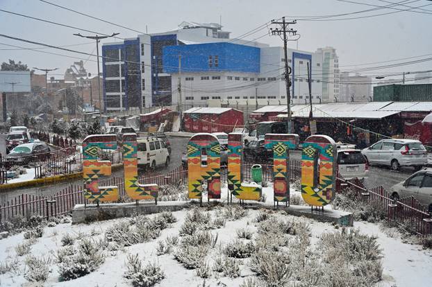 Snow falls amid low temperatures in Bolivia, in El Alto