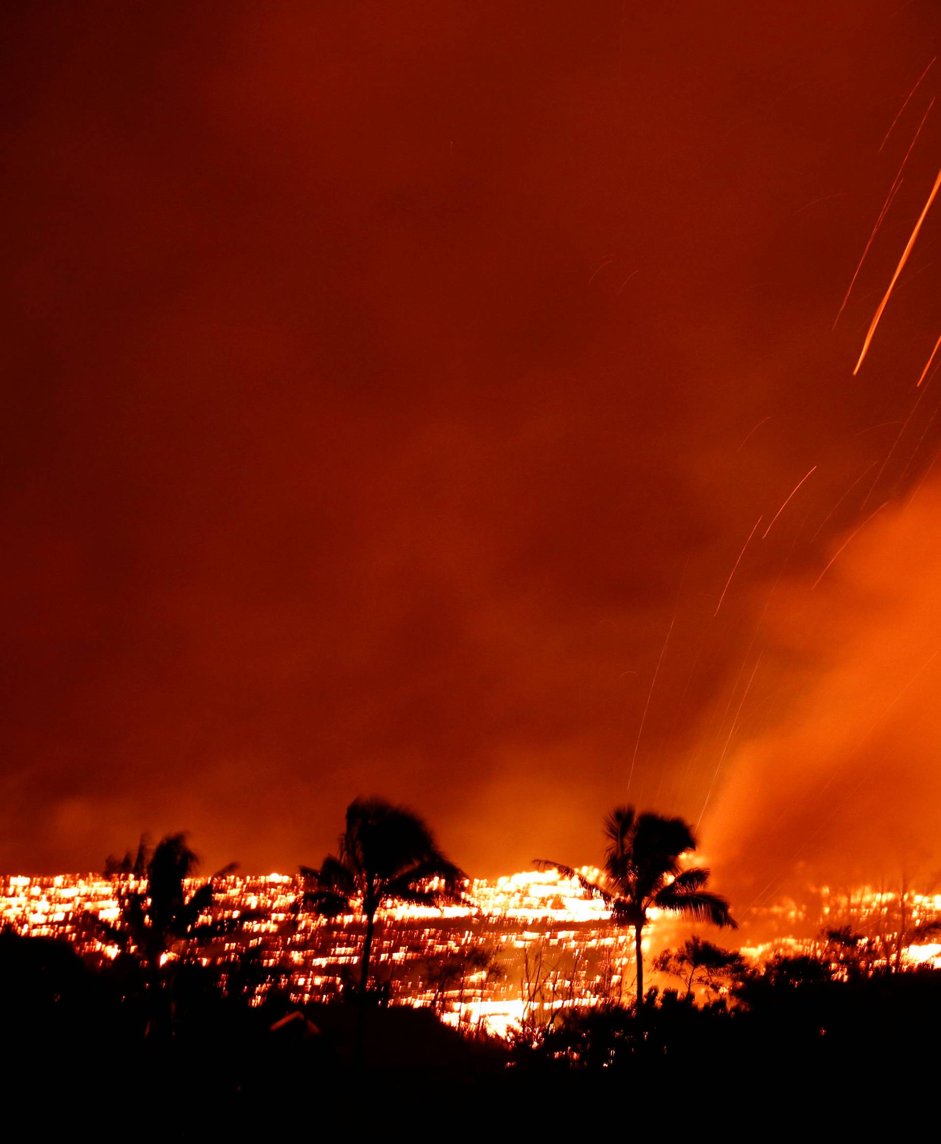 Gas erupts from a lava flow on the outskirts of Pahoa