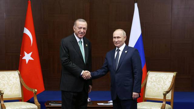 Russia's President Vladimir Putin and Turkey's President Erdogan meet on the sidelines CICA summit in Astana