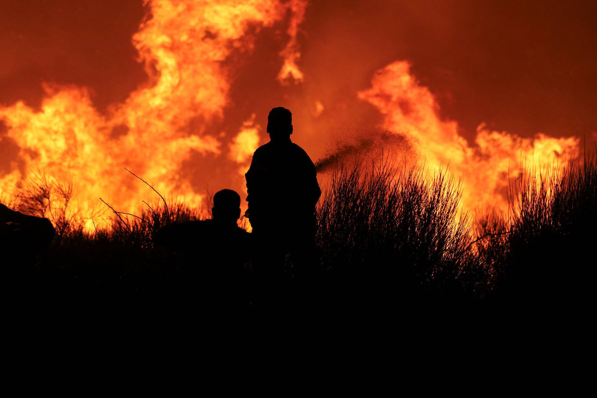 Wildfire burns in Dionysos, near Athens