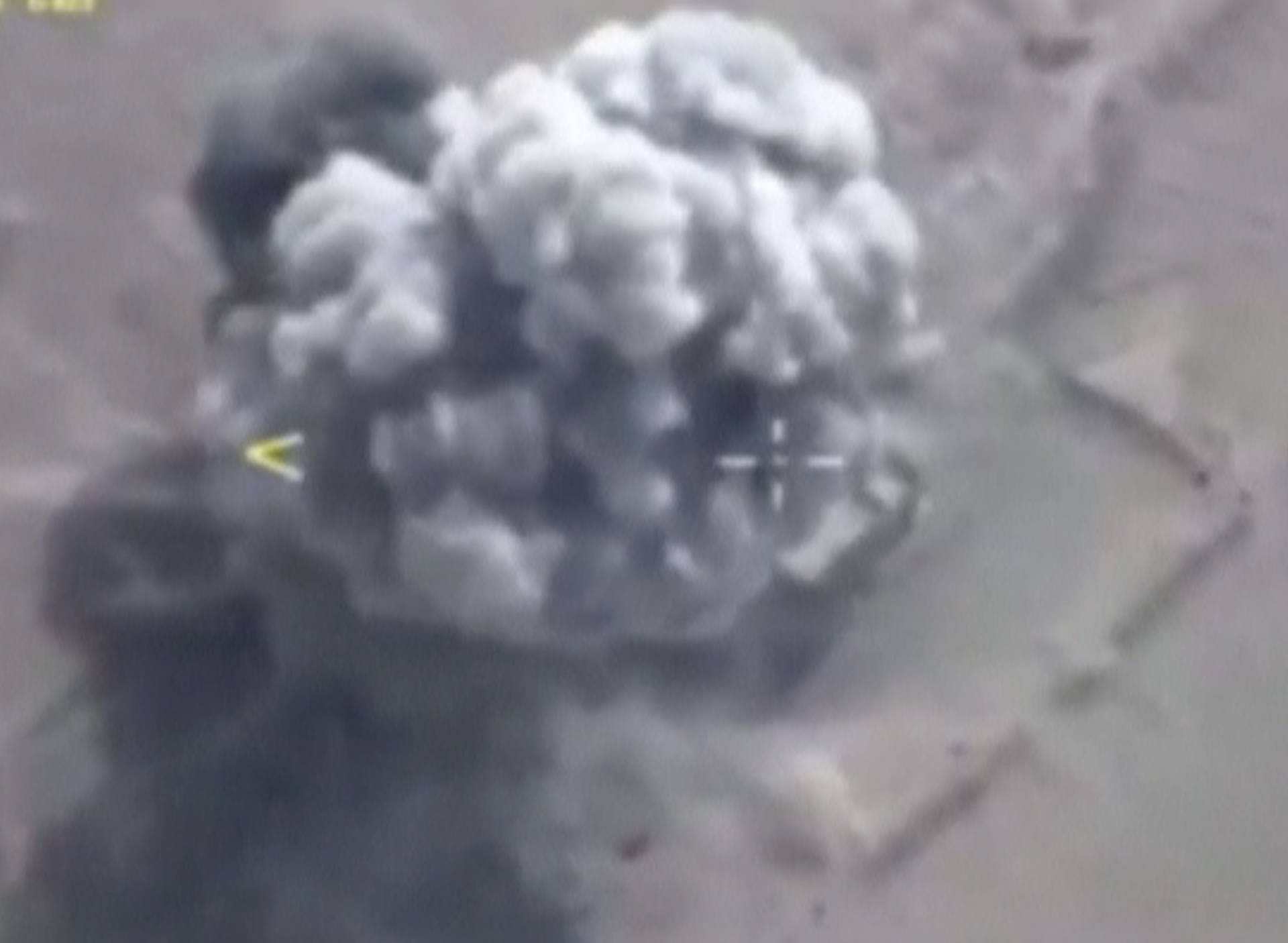 A still image shows airstrikes hitting what the Defence Ministry says was an Islamic State target in Deir al-Zor province