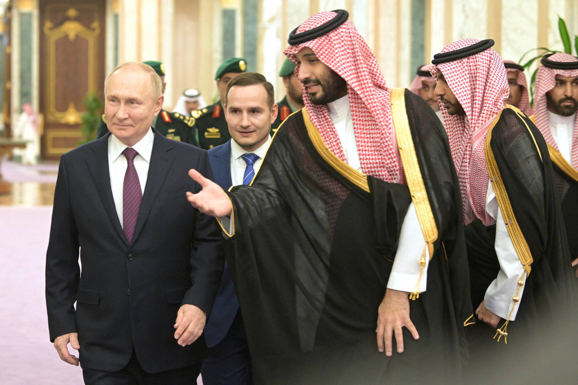 Russian President Vladimir Putin and Saudi Crown Prince Mohammed bin Salman attend a meeting in Riyadh