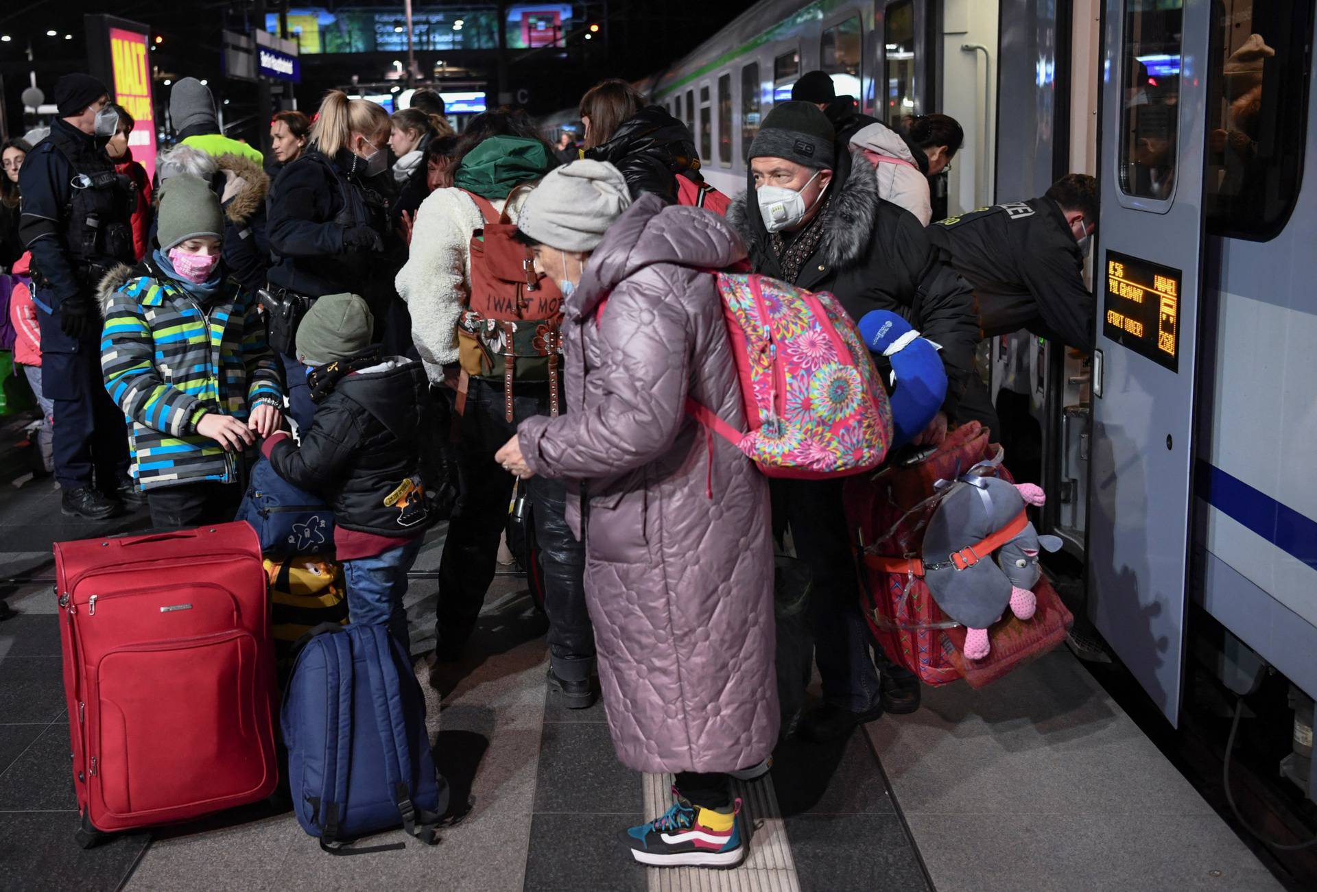 Refugees arrive in a train from Poland at Berlin's central station