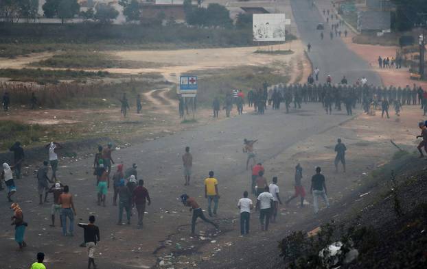 Venezuelan soldiers clash with protesters along the border between Venezuela and Brazil in Pacaraima