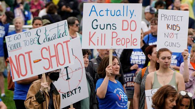 FILE PHOTO: People participate in the 'March for Our Lives' rally against gun violence