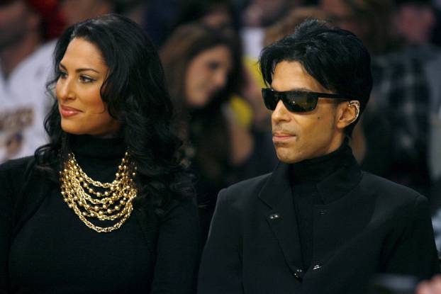 Musician Prince attends the NBA basketball game between the Los Angeles Lakers and the Boston Celtics at Staples Center in Los Angeles
