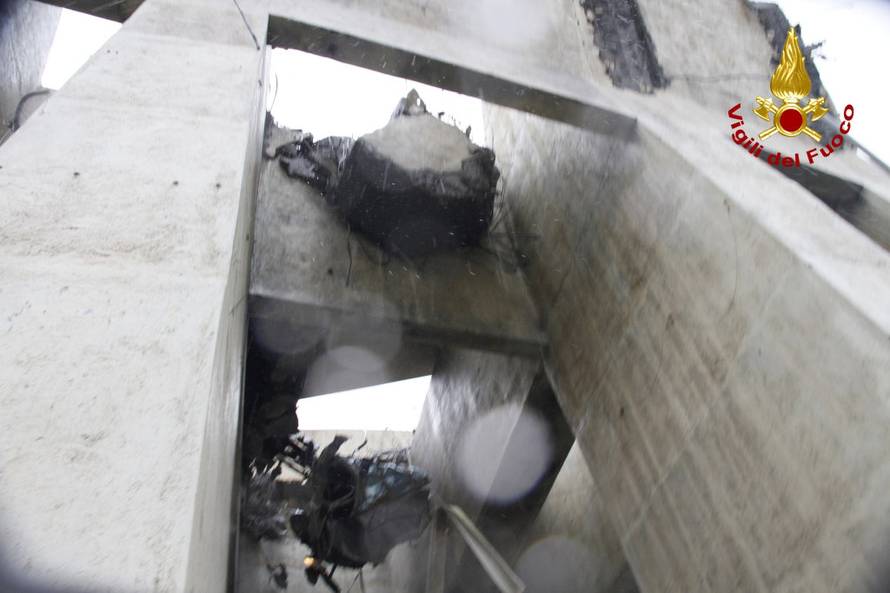 The collapsed Morandi Bridge is seen in the Italian port city of Genoa in this picture released by Italian firefighters