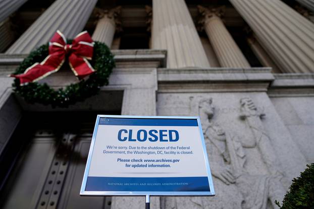 FILE PHOTO: A sign declares the National Archive is closed due to a partial federal government shutdown in Washington