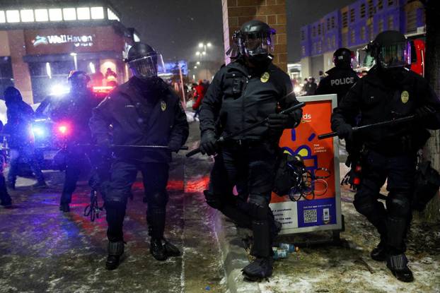 Protest outside the hotel where Bovino, who has been removed from his role, is reportedly staying, in Maple Grove