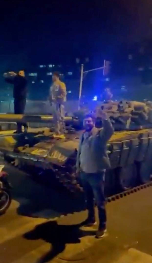 People celebrate at Umayyad Square in Damascus