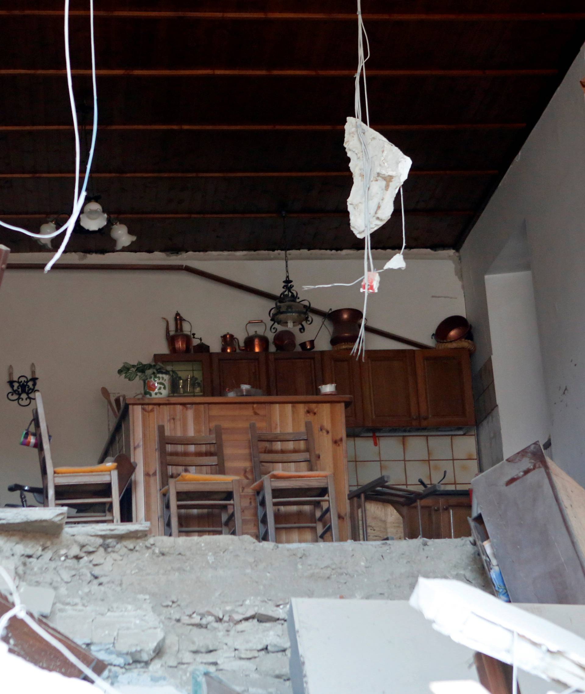 The interior of a house is seen following a quake in Amatrice