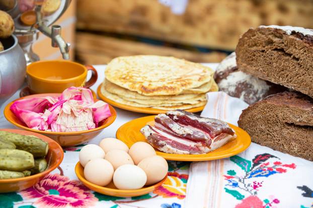 Simple rural food on the table close-up.
