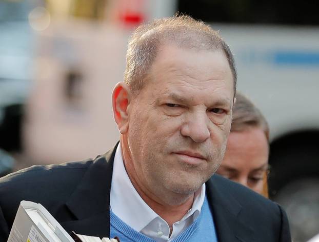 Film producer Harvey Weinstein arrives at the 1st Precinct in Manhattan in New York