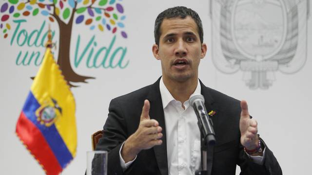 Venezuelan opposition leader Juan Guaido, who many nations have recognized as the country's rightful interim ruler, addresses the media with Ecuador's President Lenin Moreno (not pictured) in Salinas
