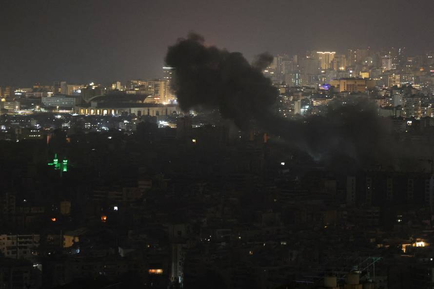 Smoke rises after Israeli strikes on Beirut's southern suburbs, following an escalation between Hezbollah and Israel amid the U.S.-Israeli conflict with Iran
