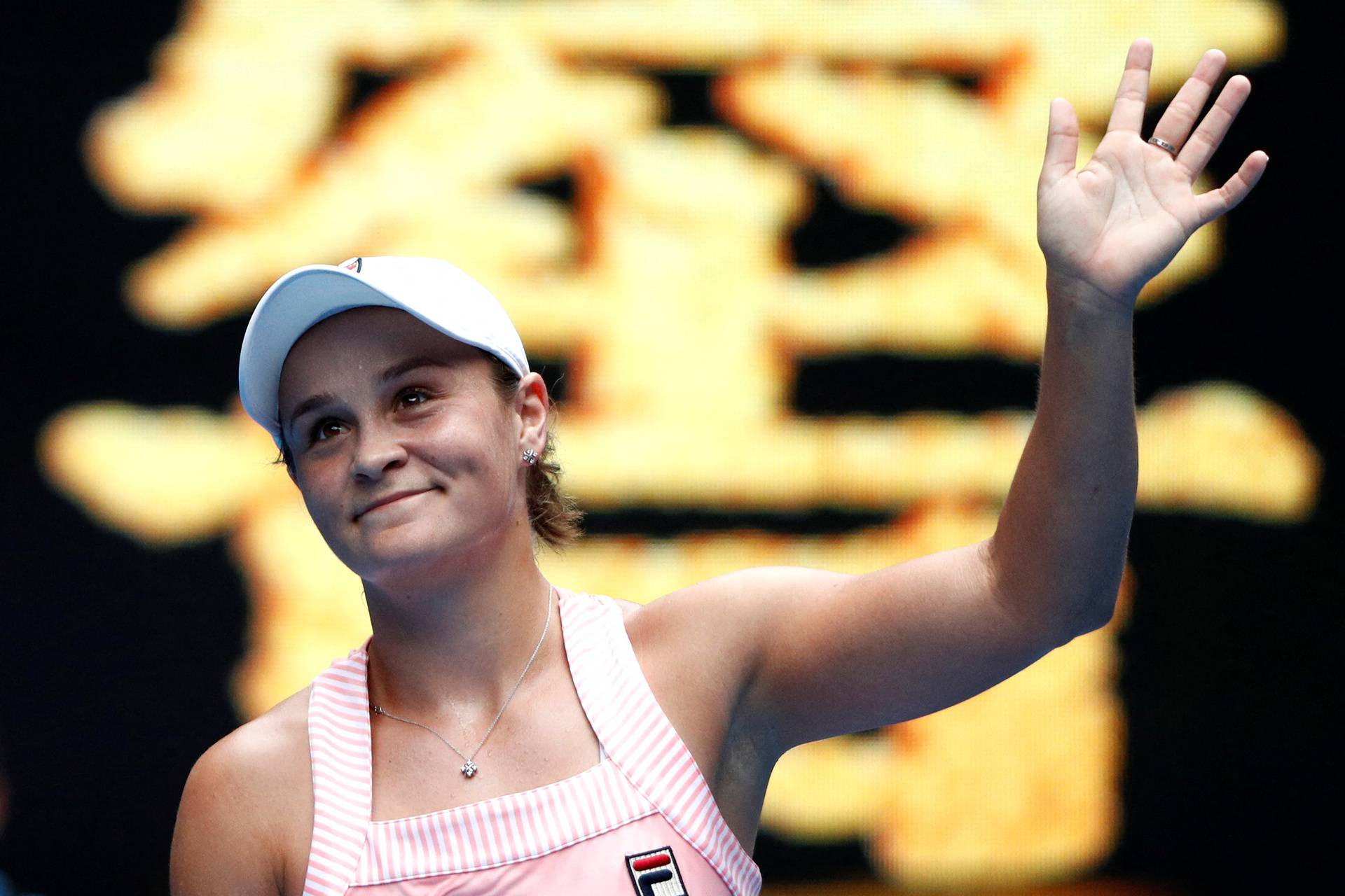 FILE PHOTO: Australia's Ashleigh Barty waves to spectators after winning the match against China's Wang Yafan