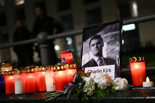 People gather to commemorate of Charlie Kirk in front of the Embassy of the United States in Berlin