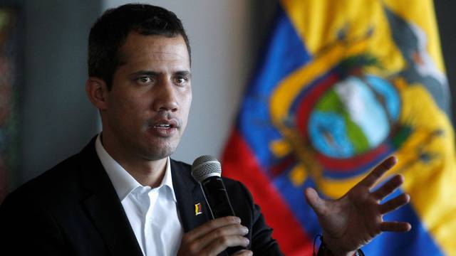Venezuelan opposition leader Juan Guaido, who many nations have recognized as the country's rightful interim ruler, speaks during a meeting with Ecuador's President Lenin Moreno (not pictured) in Salinas