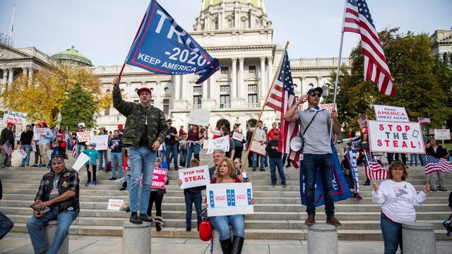 Supporters of U.S. President Donald Trump protest in front of the Pennsylvania Commonwealth capitol building in Harrisburg