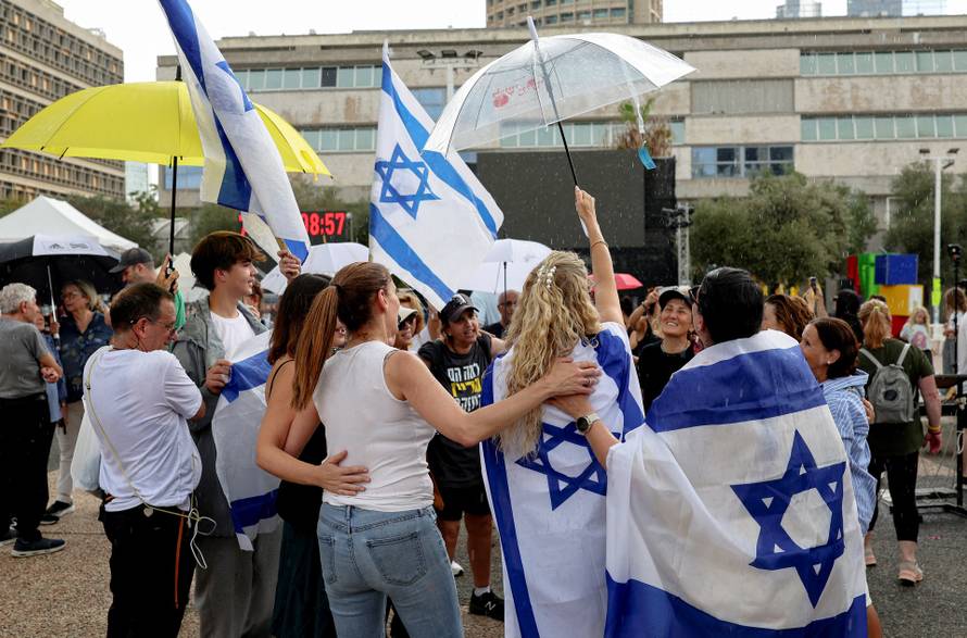 Reactions after Trump announced that Israel and Hamas agreed on the first phase of a Gaza ceasefire, in Tel Aviv