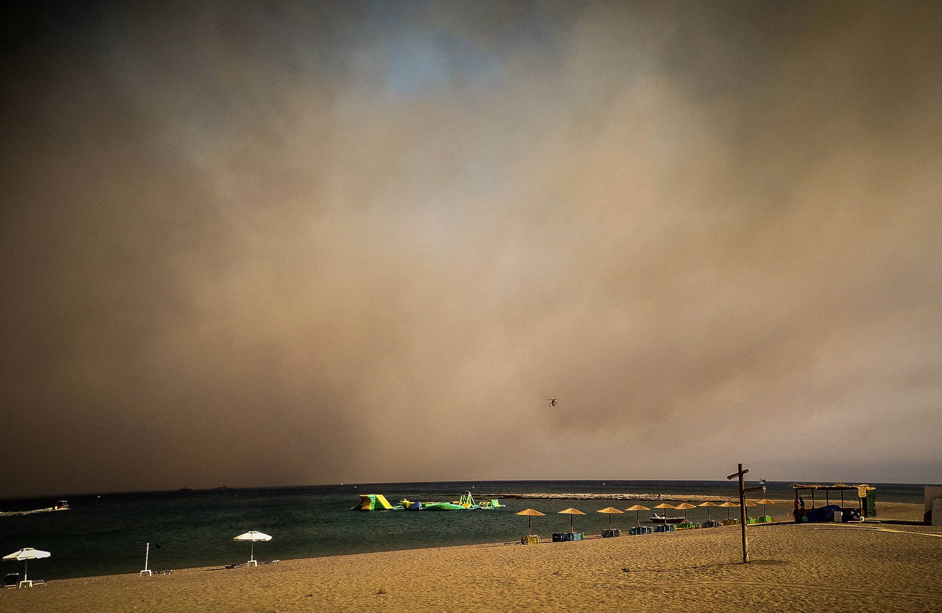 Wildfires burn forests on Greek island of Rhodes