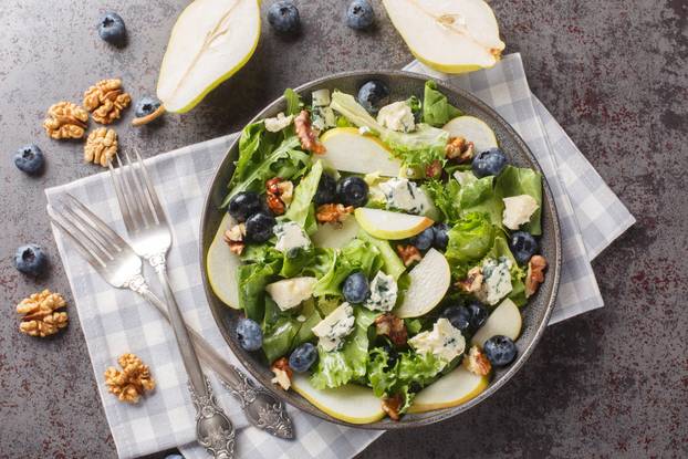 Fresh diet salad with blueberries, lettuce, gorgonzola cheese, w