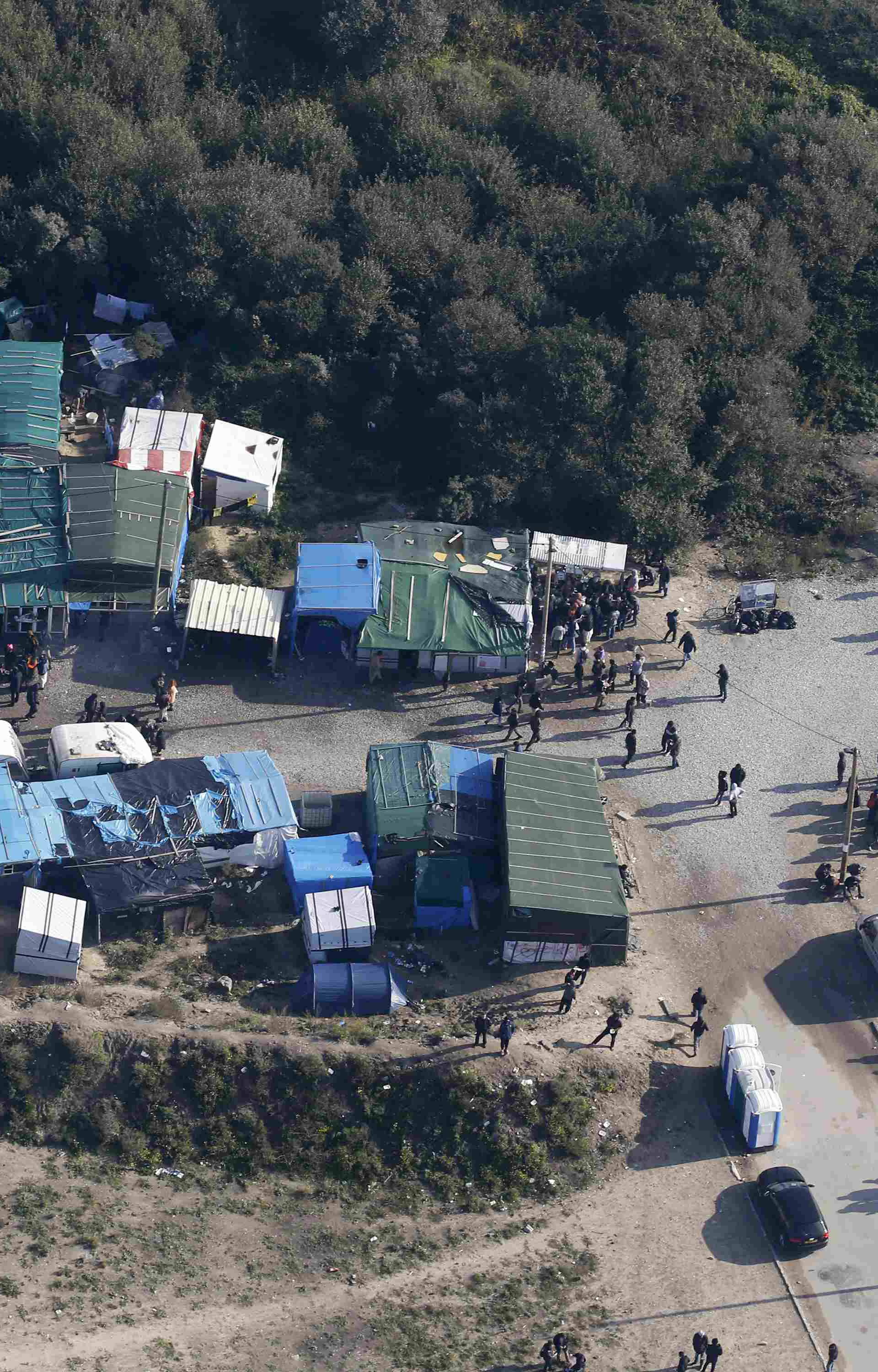 An aerial view shows tents and makeshift shelters on the eve of the evacuation and dismantlement of the camp called the "Jungle" in Calais