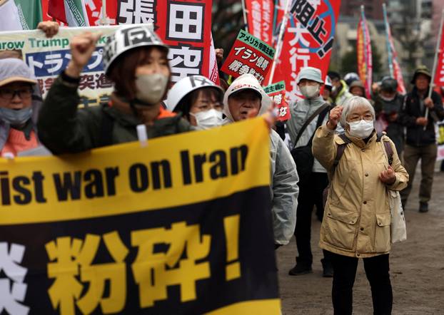 Protesters take part in an anti-U.S., anti-war and anti-Prime Minister Sanae Takaichi rally, in Tokyo