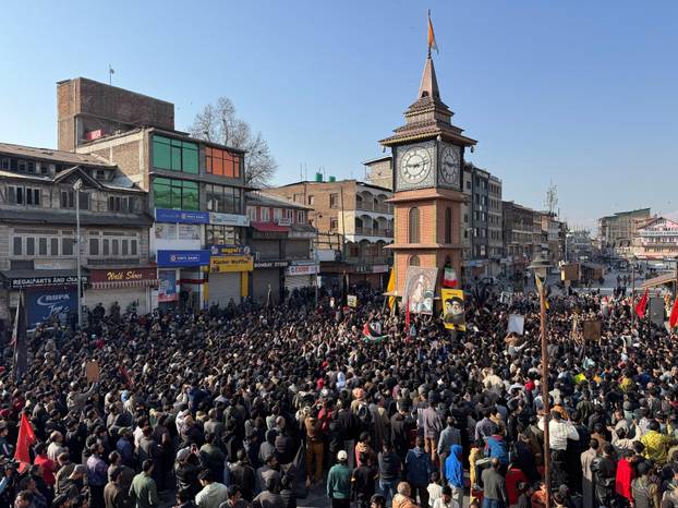 Shiite Muslims gather for a protest march in Srinagar