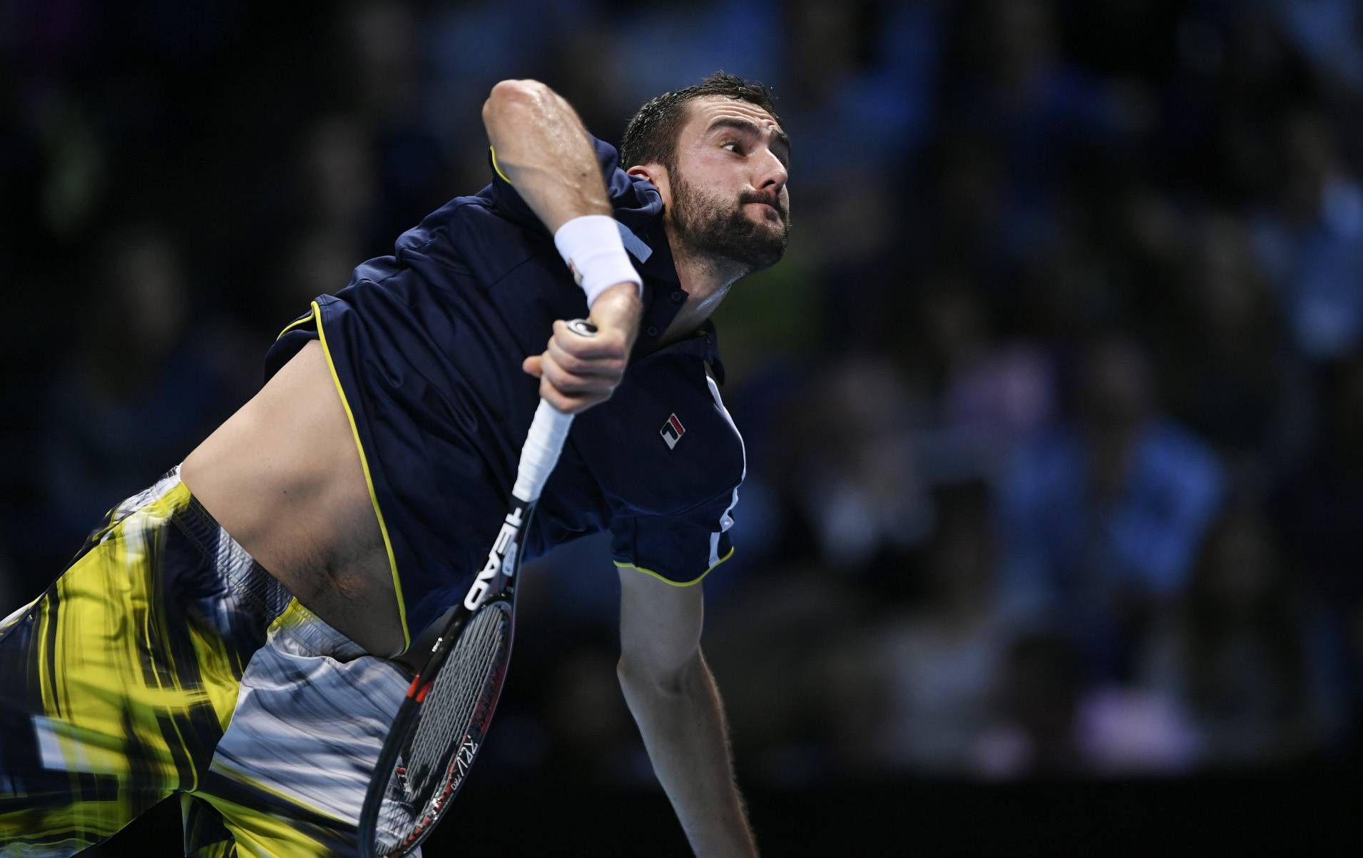 Croatia's Marin Cilic in action during his round robin match against Great Britain's Andy Murray