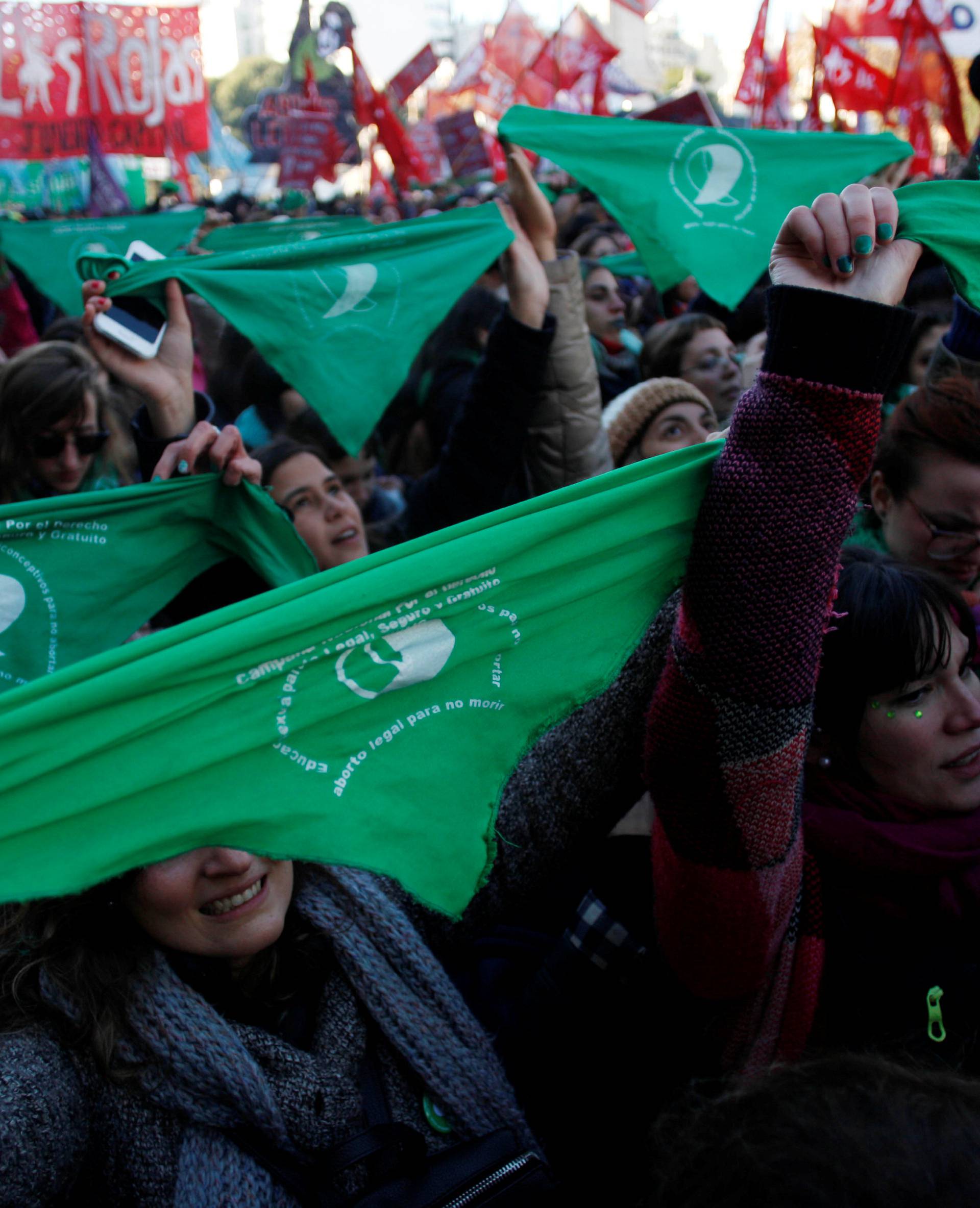 Demonstrators attend a protest in favour of legalising abortion outside the Congress while lawmakers debate an abortion bill in Buenos Aires