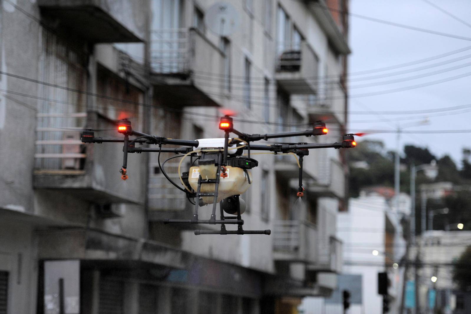 A drone is used to release disinfectant on streets during the coronavirus disease (COVID-19) outbreak in Talcahuano