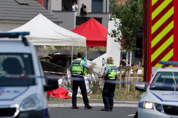 French rescuers work at the site of a plane crash, in Tomblaine