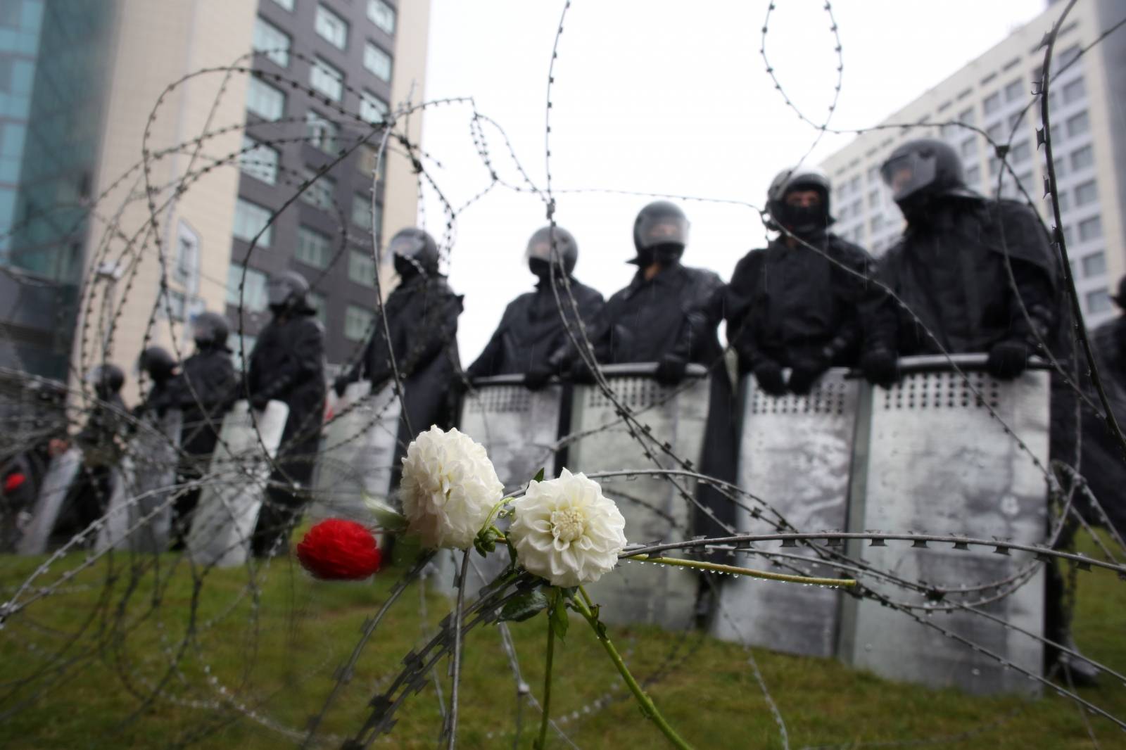 Belarusian law enforcement officers stand guard during a rally to reject the presidential election results in Minsk