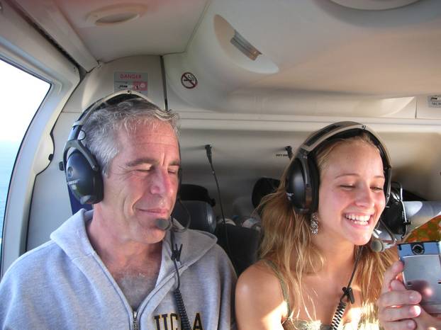 Jeffrey Epstein accuser, Teala Davies in a photo with him on a helicopter