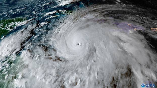 A satellite view shows Tropical Storm Melissa, over the Caribbean Sea