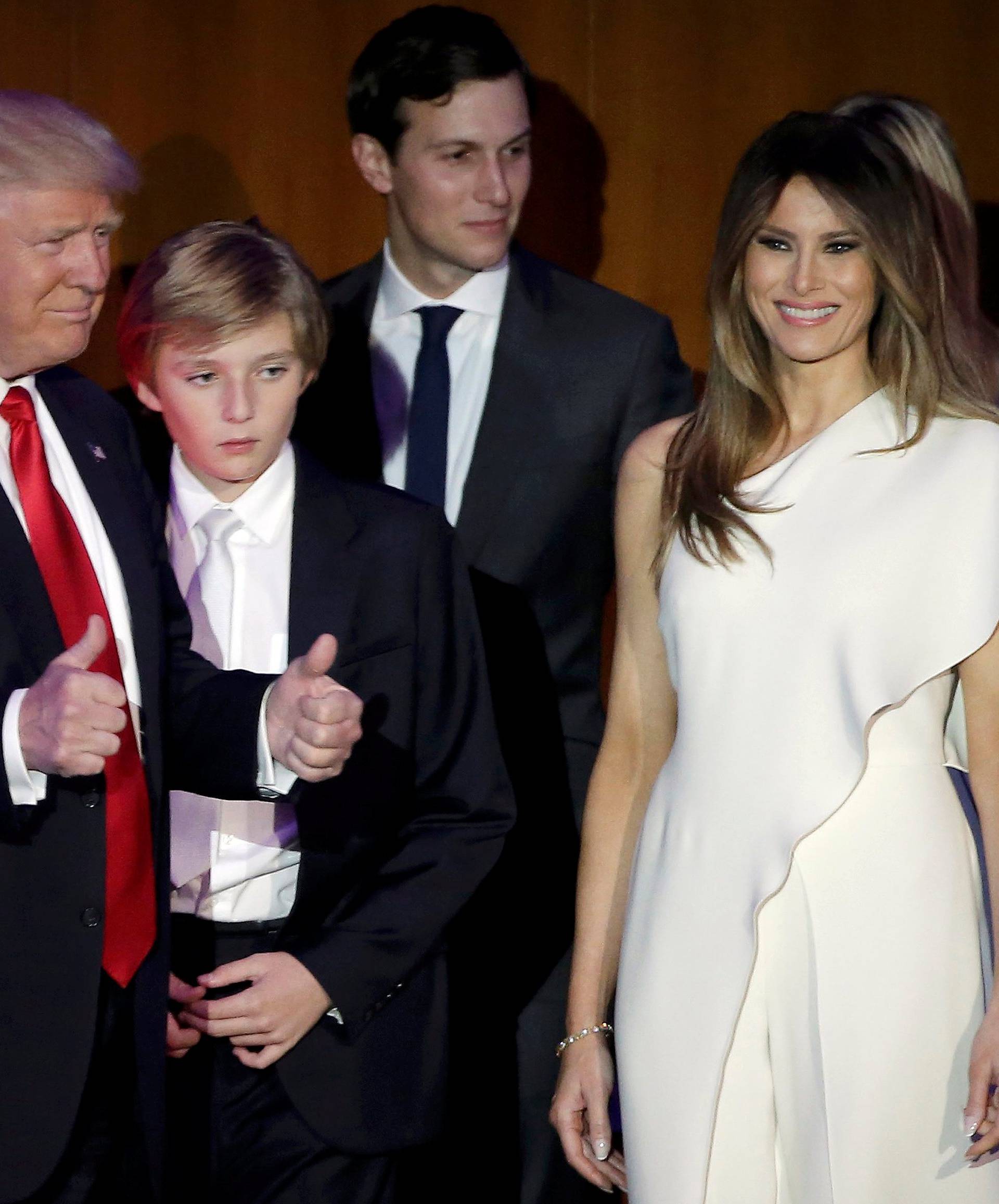 U.S. President-elect Donald Trump greets supporters along with his wife Melania and family during his election night rally in Manhattan, New York