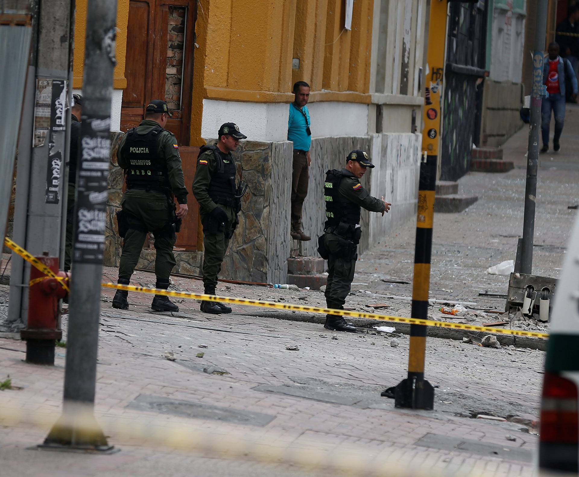 Police work the scene where an explosion occurred near Bogota's bullring