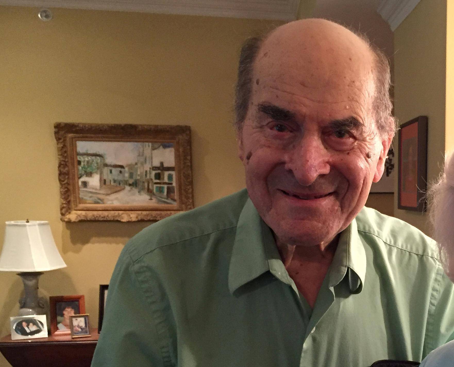 Dr. Henry Heimlich poses with Patty Ris, who he saved this week from choking on a hamburger in Cincinnati