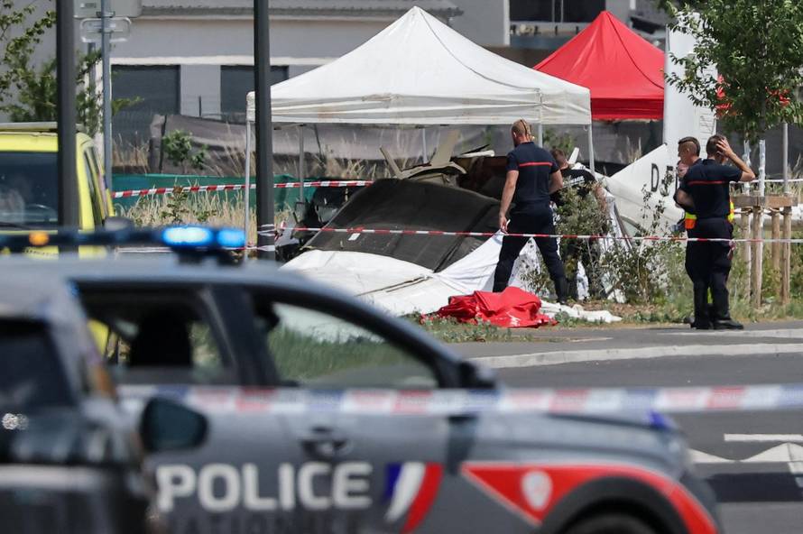 French rescuers work at the site of a plane crash, in Tomblaine
