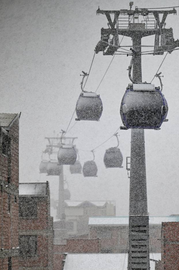 Snow falls amid low temperatures in Bolivia, in El Alto