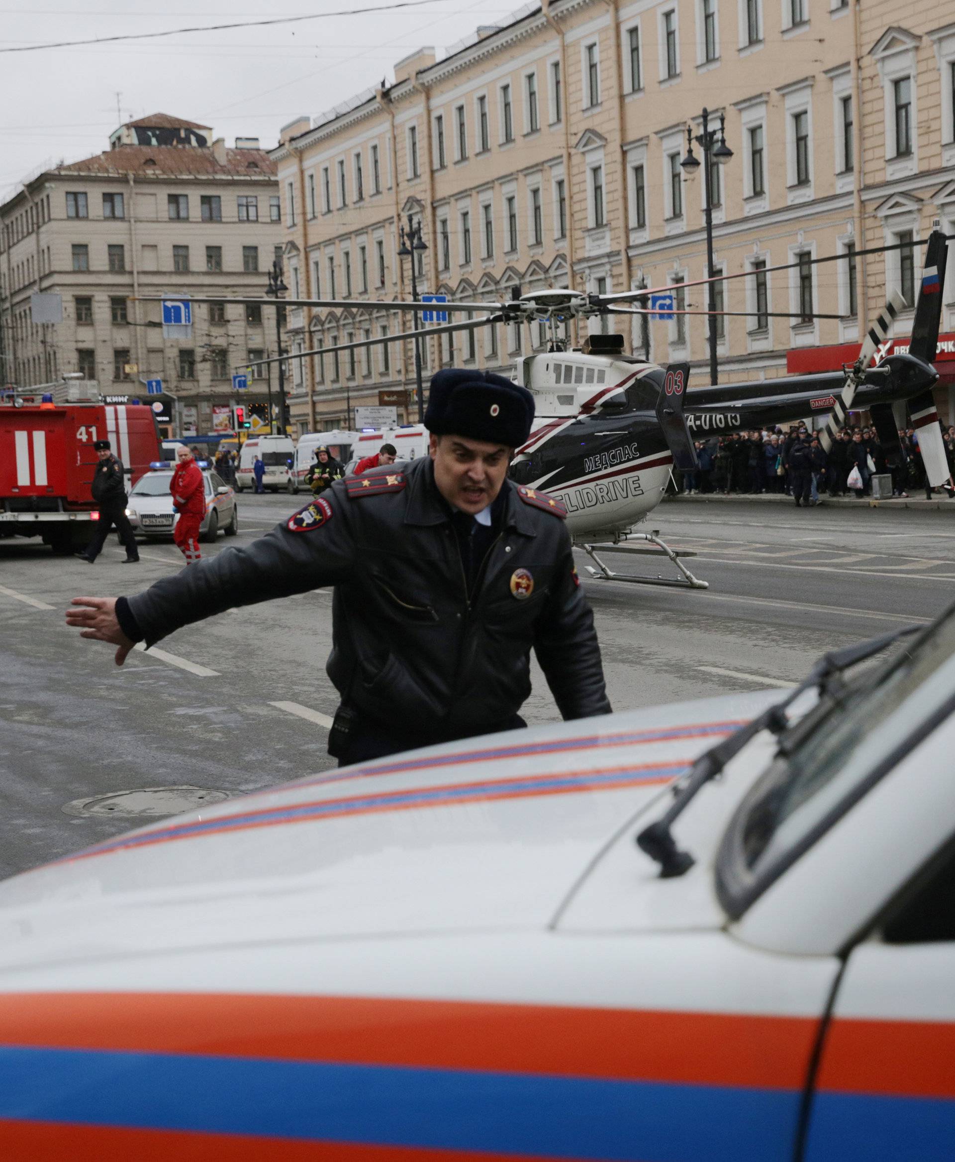 General view of emergency services attending the scene outside Sennaya Ploshchad metro station, following explosions in two train carriages in St. Petersburg