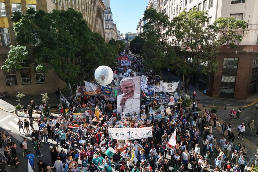 People march to pay their respects to late Pope Francis, in Buenos Aires