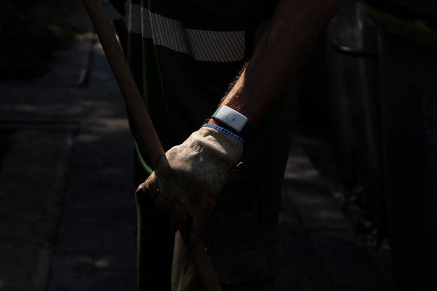 Barcelona introduces heat-monitoring bracelets for its outdoor workers