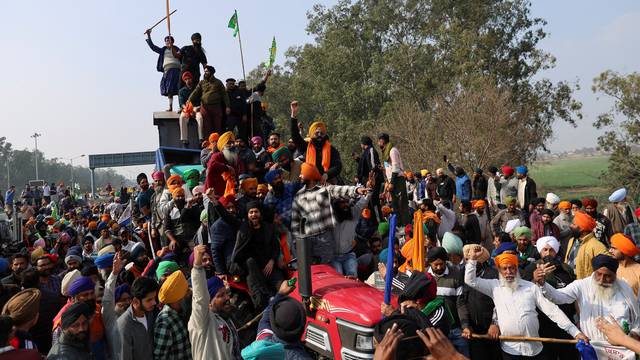 Indian farmers march towards New Delhi to press for better crop prices promised to them in 2021