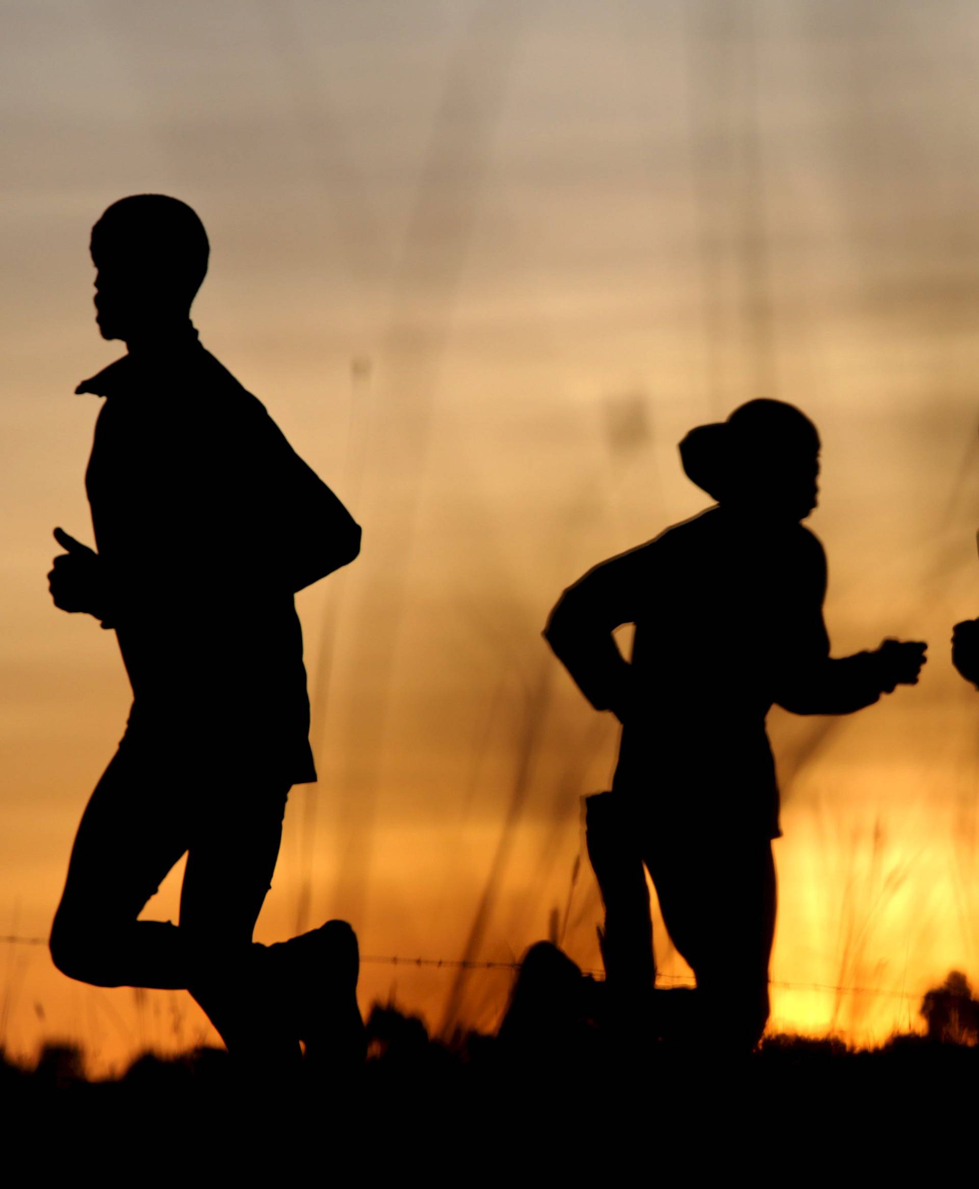 Athletes exercise in the early morning in Iten, near the town of Eldoret, western Kenya