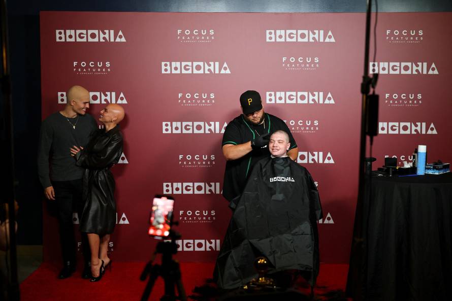 A fan gets his head shaved for a free preview of Yorgos Lanthimos’s new film 'Bugonia', in California
