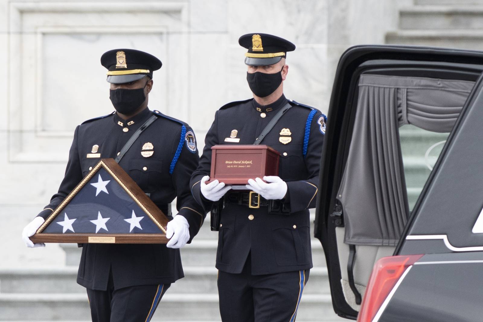 The cremated remains of U.S. Capitol Police officer Brian Sicknick depart the U.S. Capitol after resting in honor.